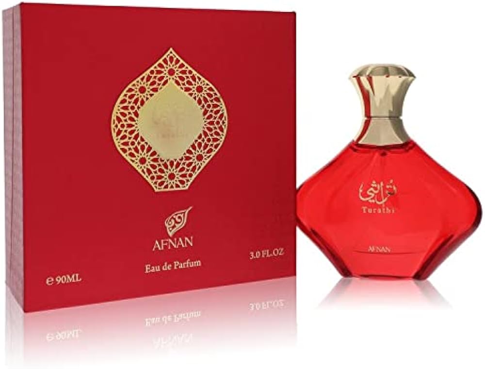 Red Afnan perfume bottle and packaging on a white background