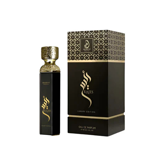 Arabiyat Prestige Raees Black 6.0 Edp, a luxury fragrance for men and women, is showcased with its packaging and bottle.