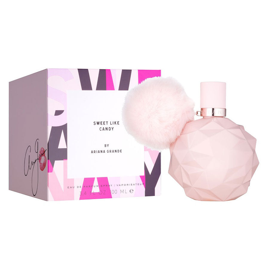 Pink perfume bottle with matching box on a white background