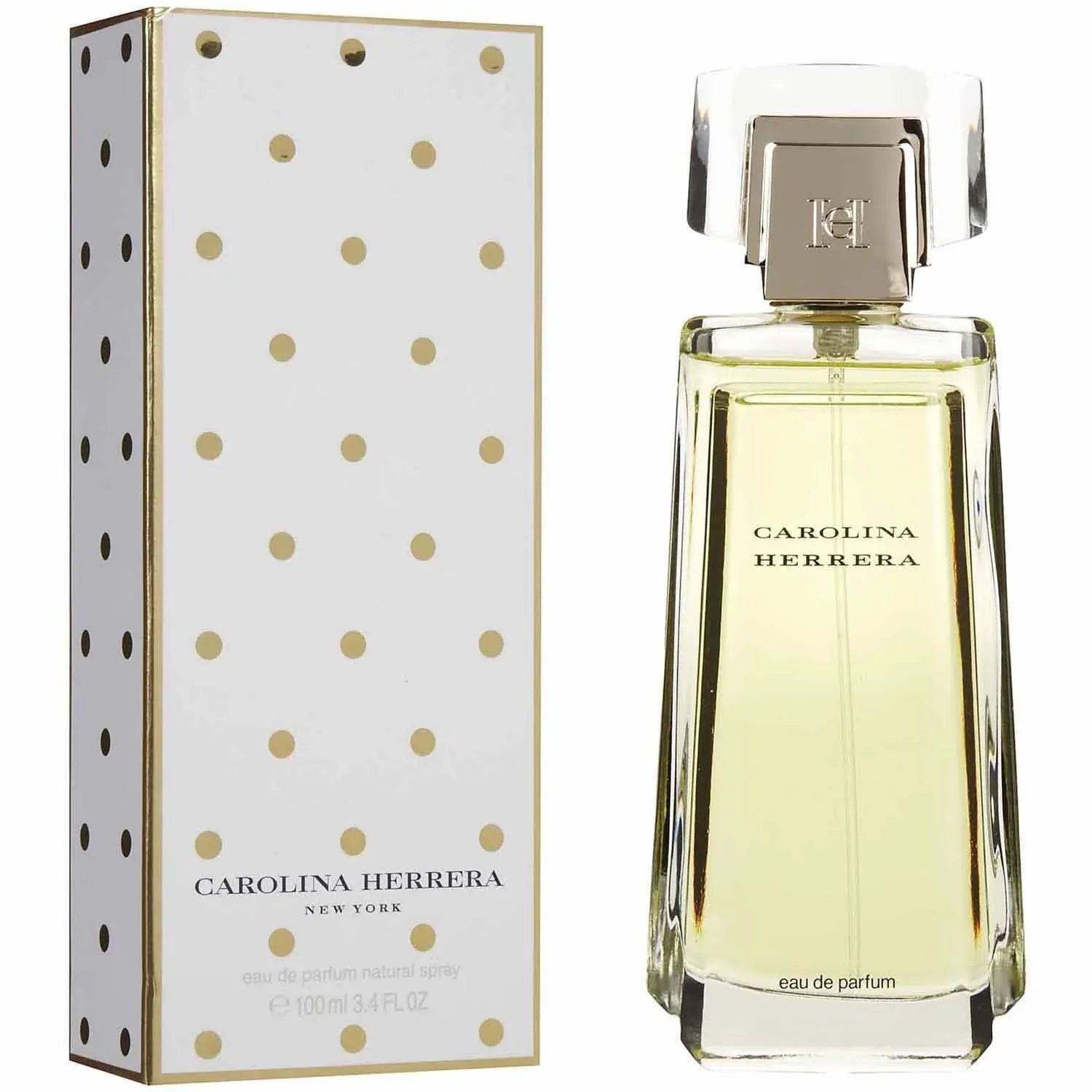 Carolina Herrera perfume bottle and packaging with gold polka dots on a white background