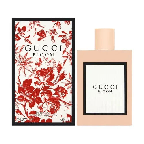 Gucci Bloom perfume bottle and packaging with floral design
