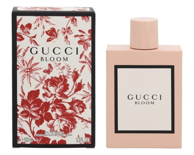 Gucci Bloom perfume bottle and packaging with floral design