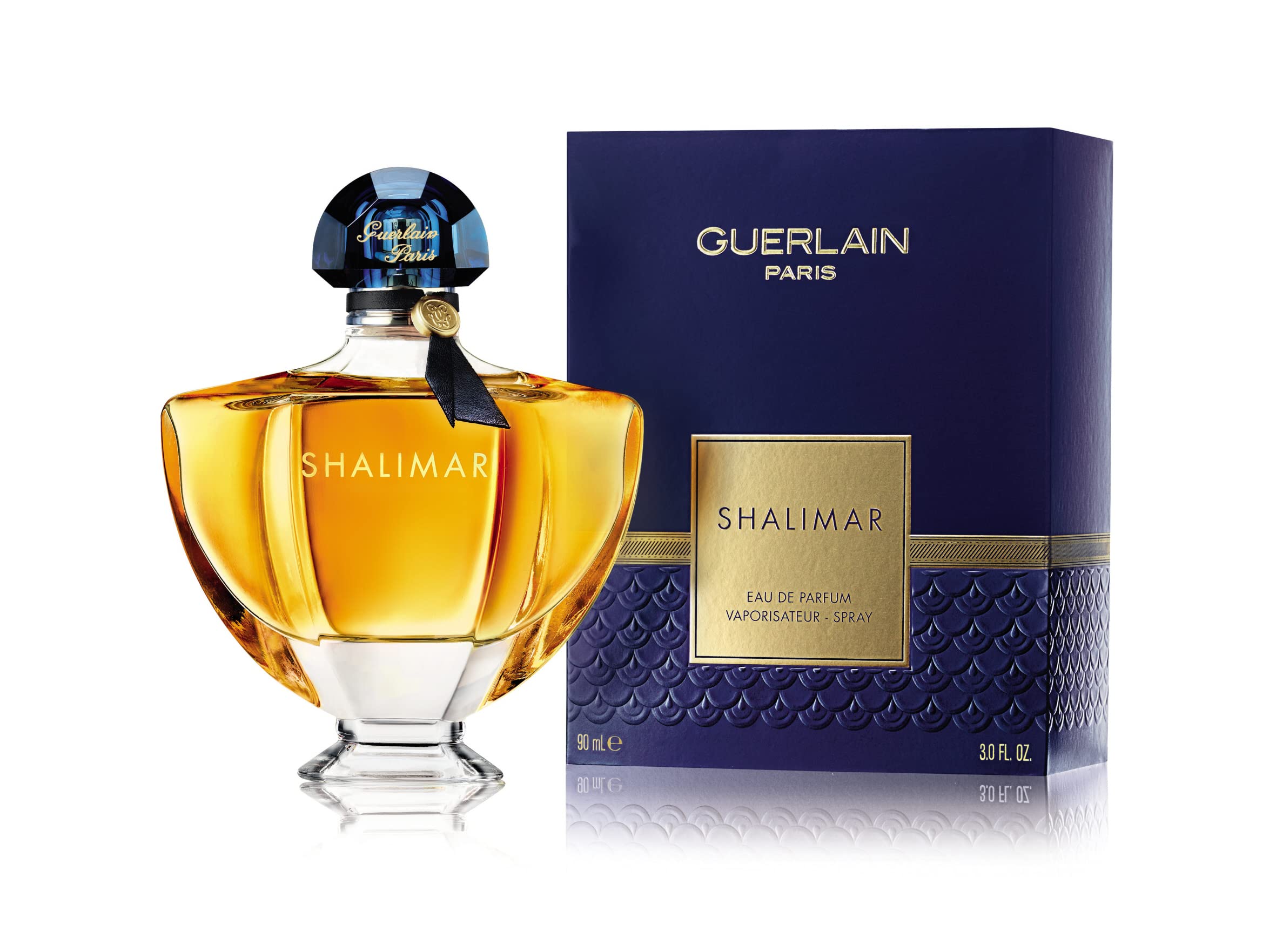Shalimar perfume bottle and packaging by Guerlain on a white background
