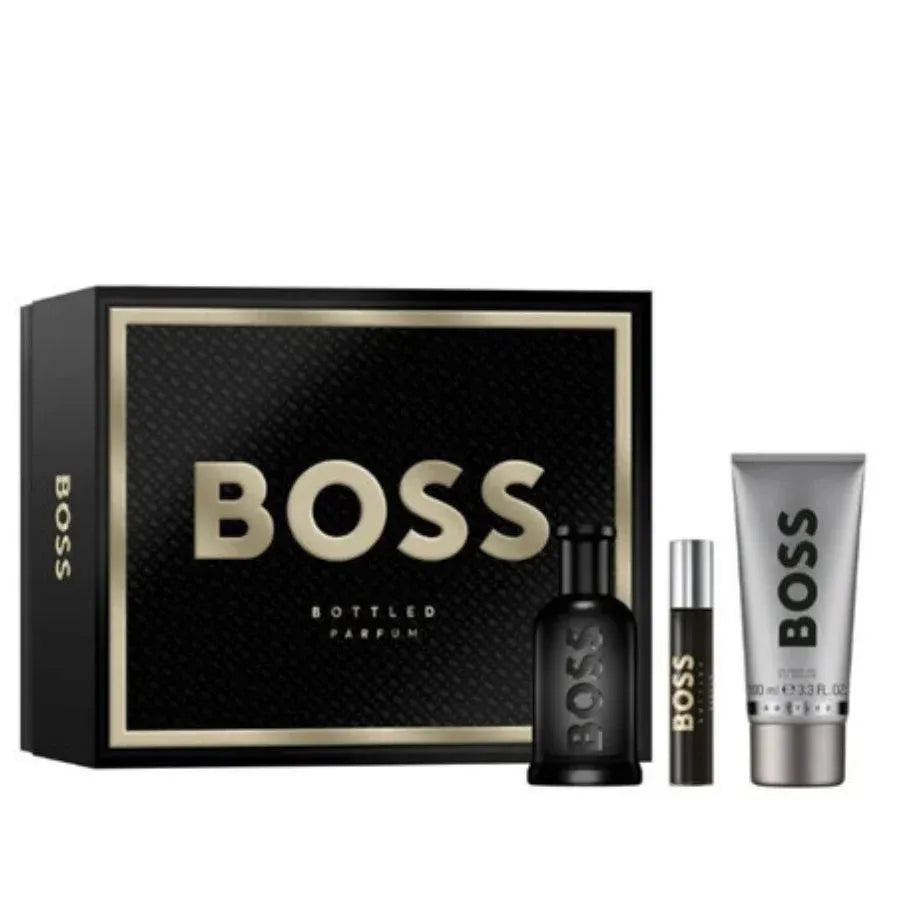 BOSS bottled perfume set with black box, bottle, rollerball, and tube on a white background