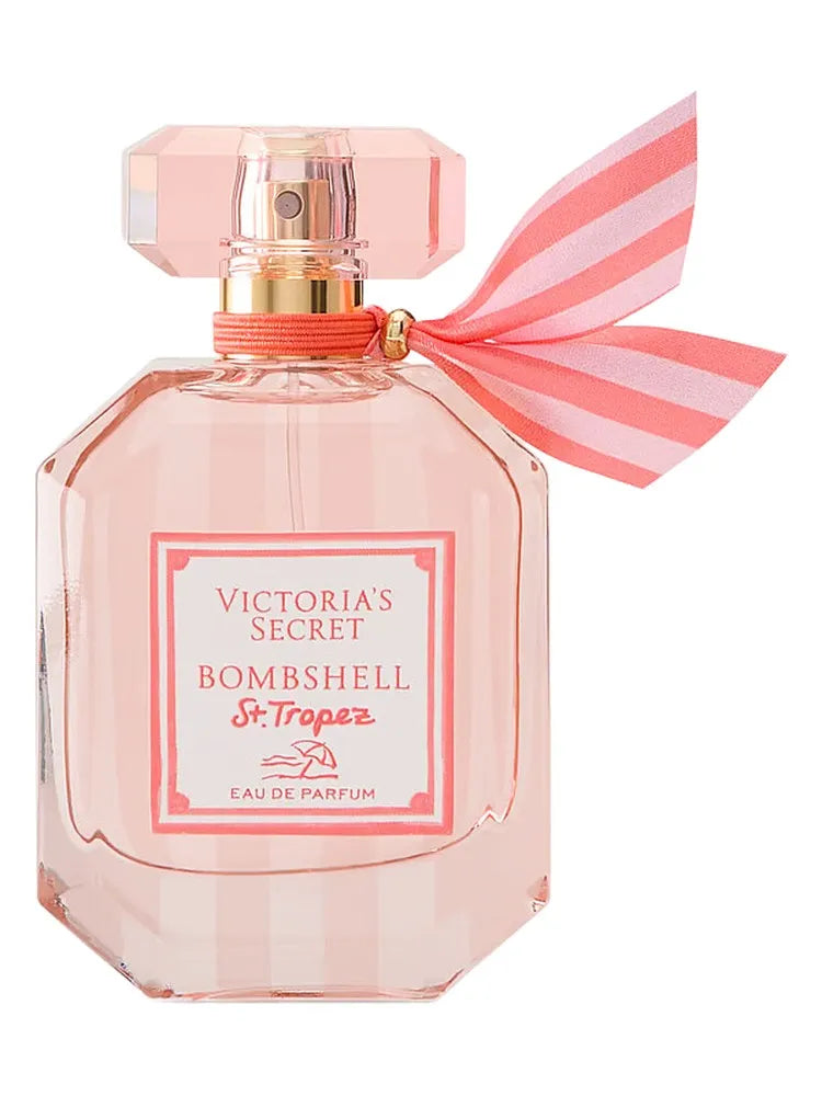Victoria's Secret Bombshell St. Tropez perfume bottle with pink ribbon on a white background