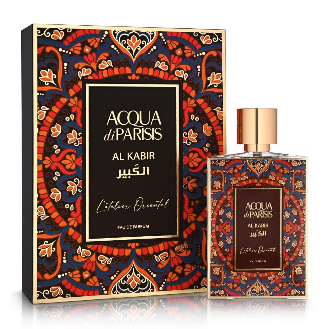 A bottle of Reyane Tradition Acqua Di Parisis Oriental Al Kabir 2.6 Edp with a decorative box featuring a geometric and floral pattern in red, gold, and black colors.